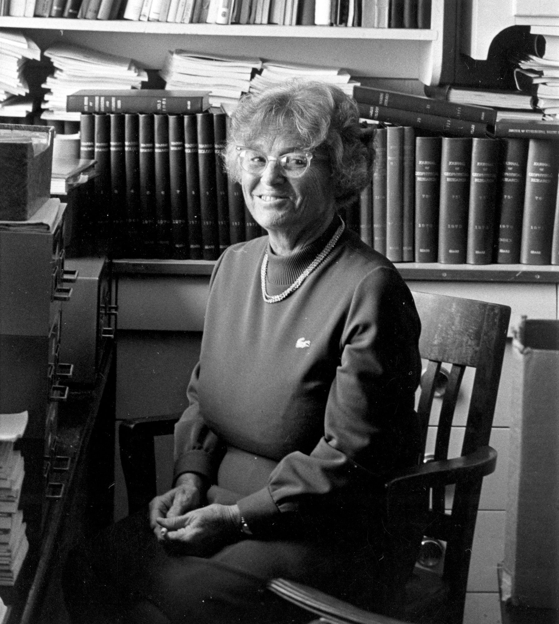 Mary Sears at desk
