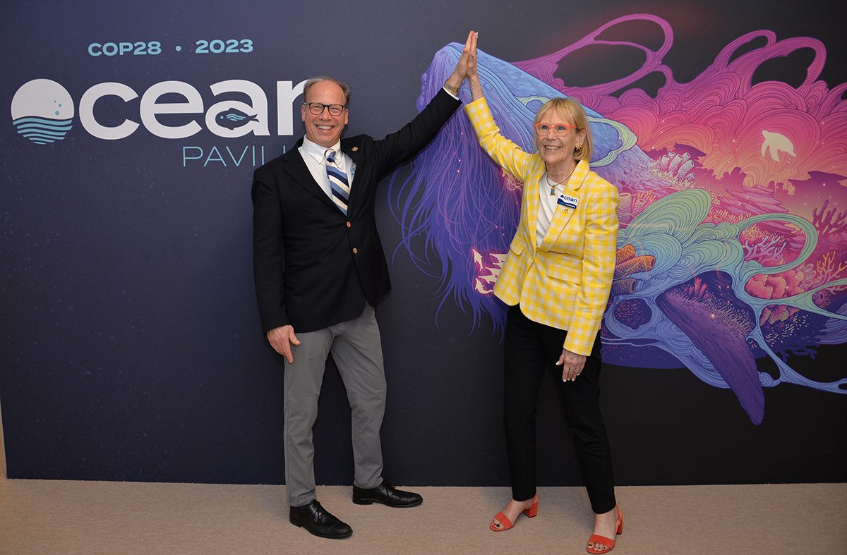 WHOI President Peter de Menocal and Scripps Oceanographic Institution President Margaret Leinen pose outside the Ocean Pavilion. (Photo by Elise Hugus, © Woods Hole Oceanographic Institution)