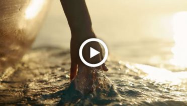 hand through water