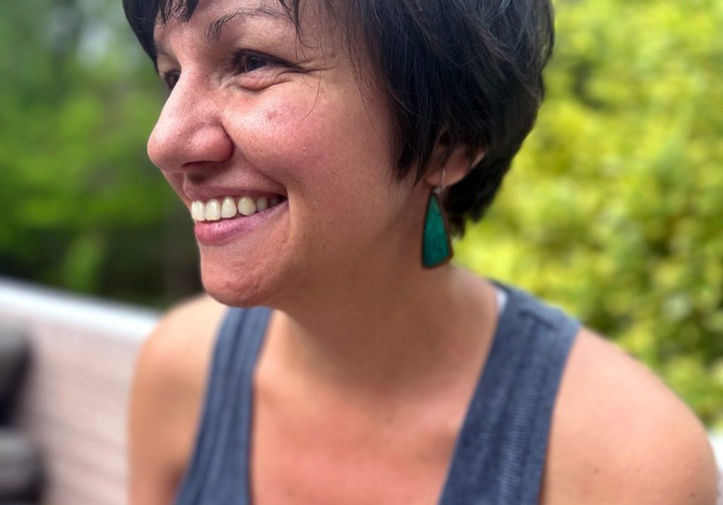 Kalina Gospodinova, a research associate at WHOI's National Ocean Science Accelerator Mass Spectrometry (NOSAMS) facility, makes jewelry inspired by the ocean in her spare time. (Photo by Elise Hugus/WHOI)